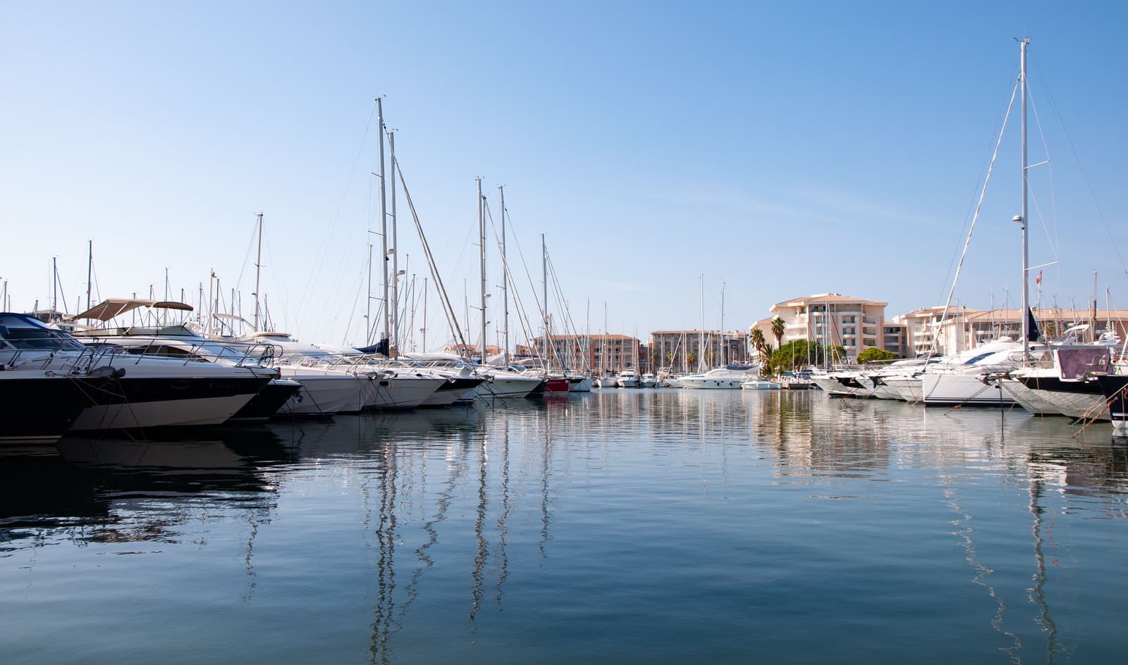 Sailing boats and motor yachts moored at Port-Fréjus